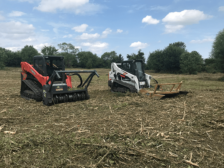 2 machines in a field that we finished clearing1